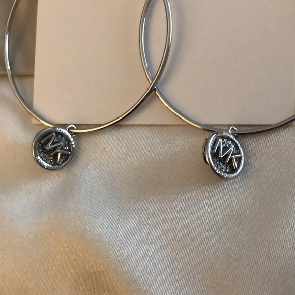 Michael Kors Silver Tone Brass Hoop Earrings With Round MK Charm & Crystal NWT - Picture 4 of 13
